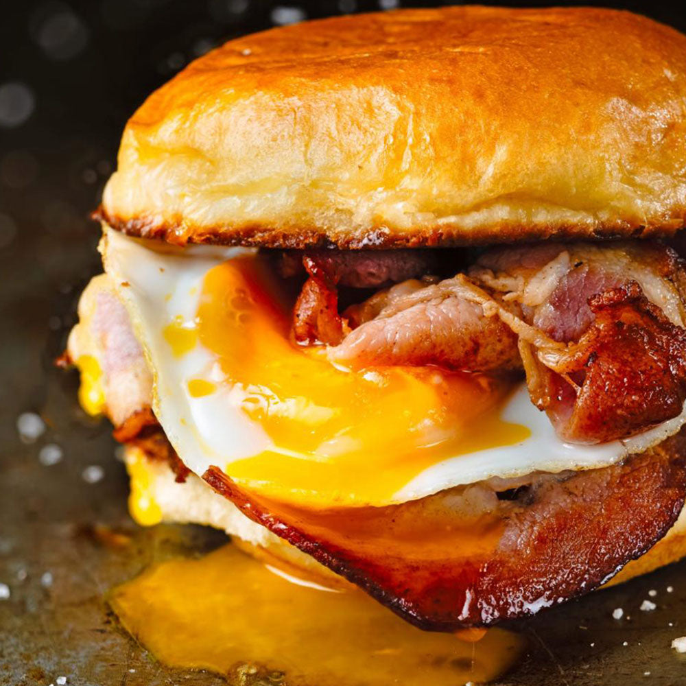 Hot - Bacon and Sausage Rolls Served in Baps